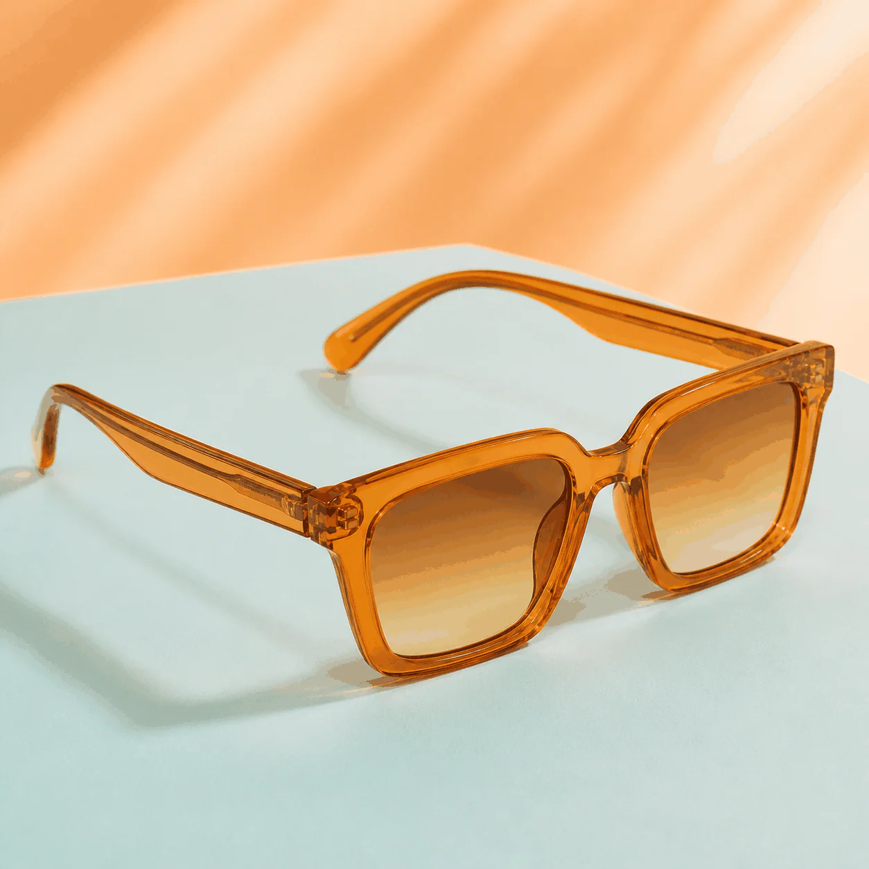 Sunset Square Sunglasses - Amber material detail